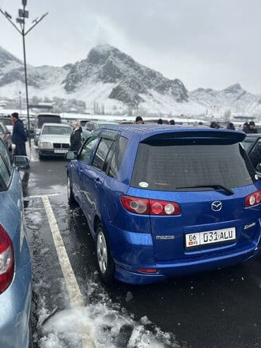 машинка б у: Mazda Demio: 2004 г., 1.5 л, Автомат, Бензин, Хэтчбэк — 5