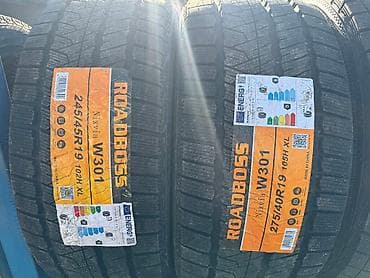 ф 90: Зимняя китайская шина. Фирма Roadboss made in China. Размер задних — 1