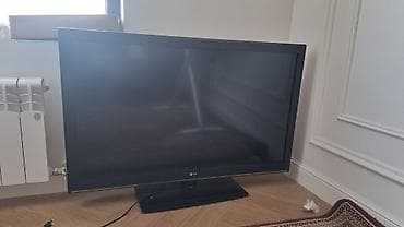 Техника и электроника: Телевизор LG, диагональ около 42–47". Плоская панель, черная рамка — 3