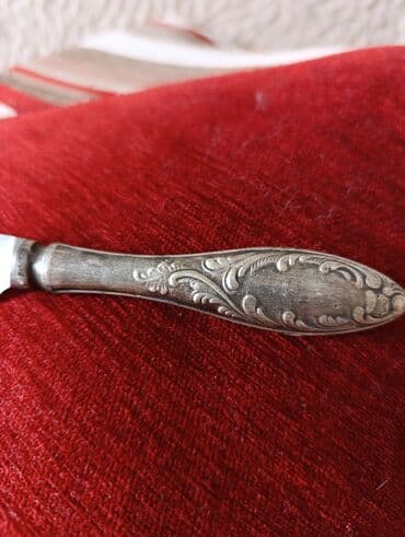 бабы растения: Это советский нож для масла с декоративной ручкой, предположительно — 2