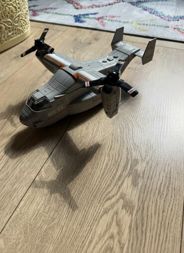 где купить антистресс: Игрушечный (самолет‑вертолет) серого цвета с двумя поворотными винтами — 1