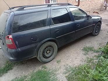 вольво v70: Opel Astra: 1999 г., Механика, Универсал — 2