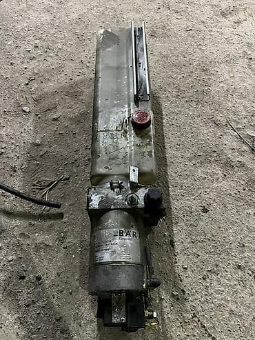 ремонт насоса воды: Гидравлический агрегат BÄR Cargolift для подъемно-задних платформ — 1