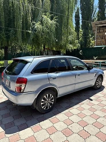 атего 1229: Mazda Familia: 1998 г., 1.8 л, Автомат, Бензин, Универсал — 4
