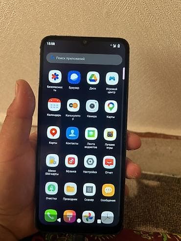 ми 9 а: Смартфон на Android с каплевидным вырезом фронтальной камеры и большим — 2