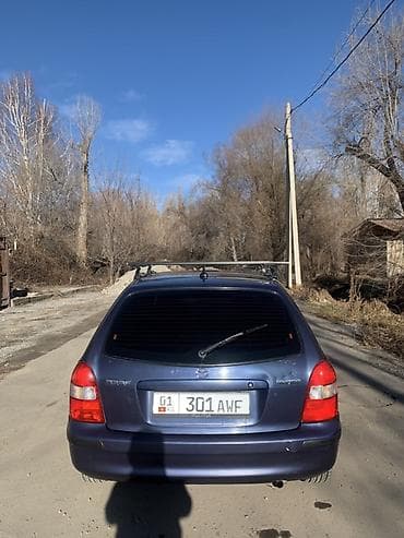 мазда xsedos: Mazda Familia: 2001 г., Механика, Бензин, Универсал — 7