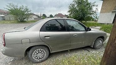 Продажа авто: Daewoo Nubira: 1999 г., Механика, Бензин, Седан — 3