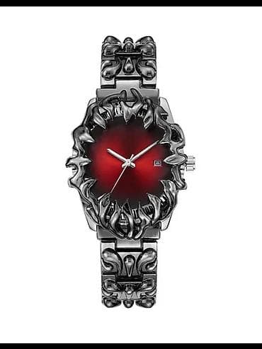 Часы наручные с выразительным дизайнерским оформлением в стиле