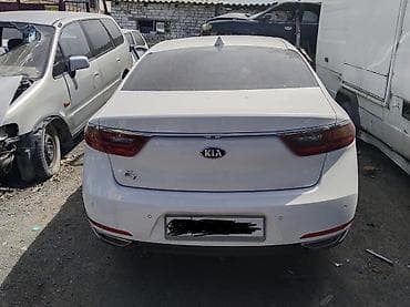 su 7: Kia K7, 2017 белый седан, после ДТП — 2