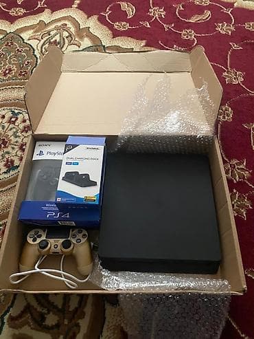 Техника и электроника: Игровая консоль Sony PlayStation 4 (Slim) Комплектация: - Консоль PS4 — 1