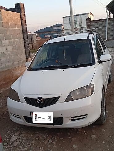 Mazda Demio: 2004 г., 1.5 л, Автомат, Бензин, Хэтчбэк