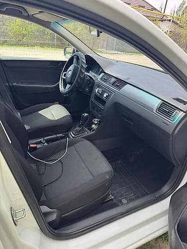 электромобиль лабо: Skoda Rapid: 2016 г., 1.6 л, Автомат, Бензин, Седан — 5