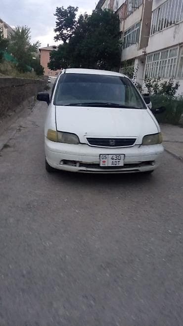 сидения трактор: Honda Odyssey: 1996 г., 2.2 л, Автомат, Бензин, Минивэн — 2