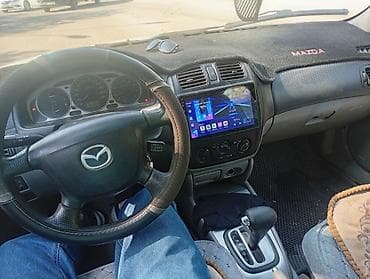 mazda demio 2004: Mazda 323: 2002 г., Механика, Хэтчбэк — 6