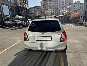 степ вагон спада 2003: Mazda Familia: 2002 г., 1.5 л, Автомат, Бензин, Универсал — 2