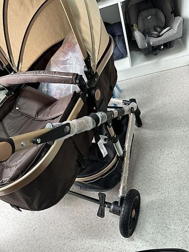 4 mom: Коляска, Другой бренд, цвет - Коричневый, Новый — 1