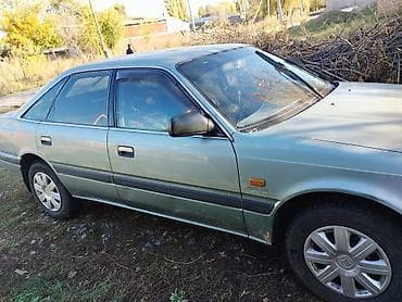 daf 480: Mazda 626: 1990 г., Бензин, Седан — 5