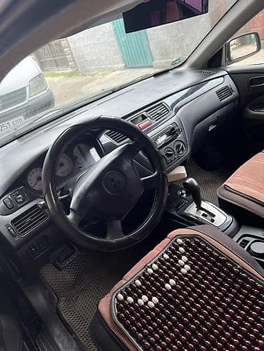 byd leopard 5: Mitsubishi Lancer: 2003 г., 1.6 л, Автомат, Бензин, Универсал — 9