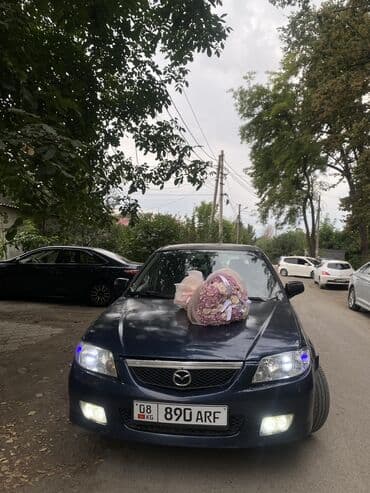 бампер на москвич: Mazda 323: 2001 г., 1.6 л, Механика, Бензин, Универсал — 1