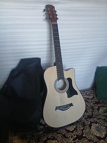 Музыкалык аспаптар: Акустическая гитара типа дредноут с вырезом (cutaway) — 2