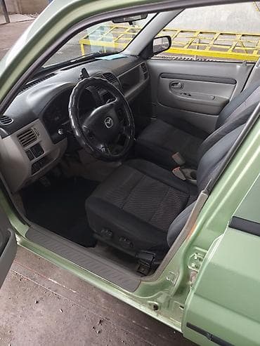 devo matiz: Mazda Demio: 2003 г., 1.5 л, Механика, Бензин, Минивэн — 5
