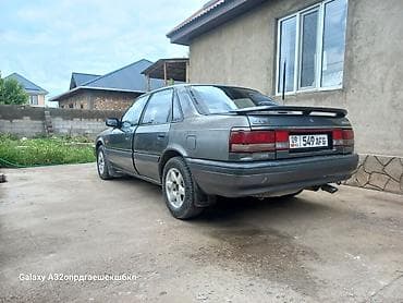 Транспорт: Mazda 626: 1991 г., 2 л, Кол менен иштөөчү, Бензин, Седан — 3