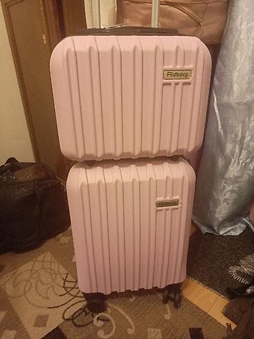 Комплект чемоданов Ridberg, розовый цвет. - Два чемодана разного