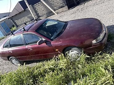 сед: Mazda 626: 1994 г., 2 л, Механика, Бензин, Седан — 5