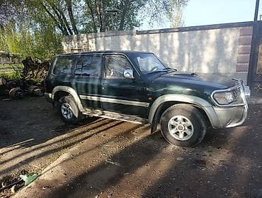 боковой: Nissan Patrol: 1999 г., 3 л, Ручные, Дизель, Внедорожник — 2
