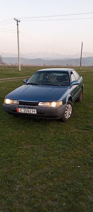 бар авто: Mazda 626: 1987 г., 2 л, Кол менен иштөөчү, Бензин, Хетчбек — 2