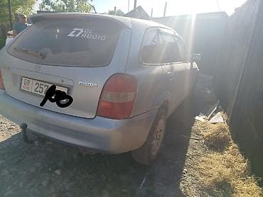 235 60 р18: Mazda 323: 2003 г., 1.6 л, Механика, Бензин, Универсал — 4