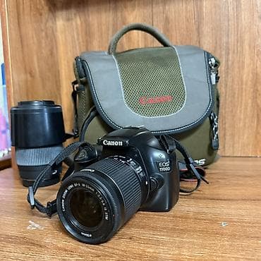 бленде: Зеркальная камера Canon EOS 1100D с комплектом оптики и сумкой — 2
