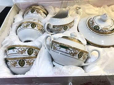 Дом и сад: Фарфоровый чайный сервиз в подарочном чемодане.
Новый! — 2