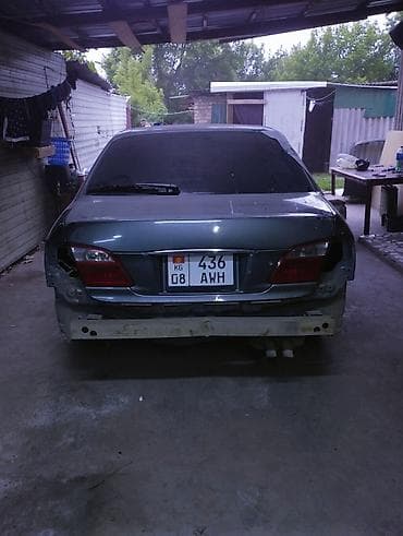 кия бонго: Седан бизнес‑класса (похоже на Toyota/ Lexus семейства ES/GS конца — 4