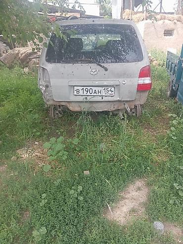 аудио касета: Mazda 2: 2003 г., 1.3 л, Автомат, Бензин, Хэтчбэк — 1