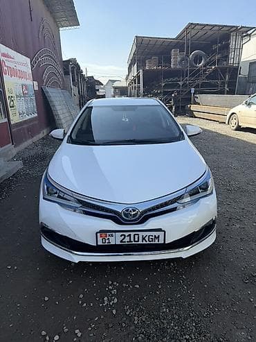 Toyota Corolla: 2019 г., 1.8 л, Автомат, Гибрид, Седан