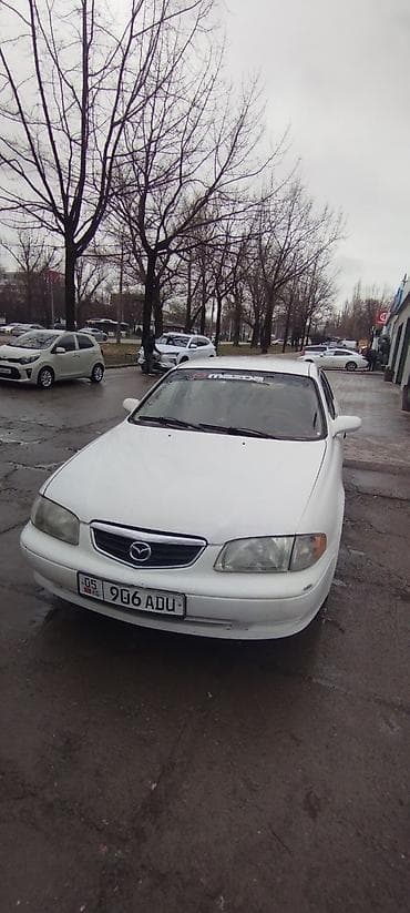 lada largus: Mazda 626: 2000 г., Механика, Седан — 9