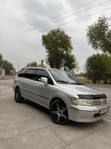 обмен машинами с доплатой: Mitsubishi Space Wagon: 2002 г., 2 л, Механика, Бензин, Минивэн — 1