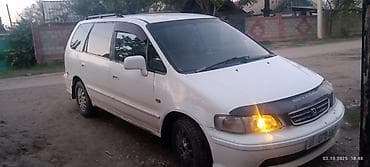 Honda Odyssey — семейный минивэн - Кузов: белый 5‑дверный минивэн at lalafo.kg Honda Odyssey — семейный минивэн - Кузов: белый 5‑дверный минивэн