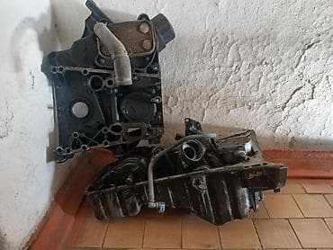 Блок цилиндров с масляным поддоном и масляным теплообменником