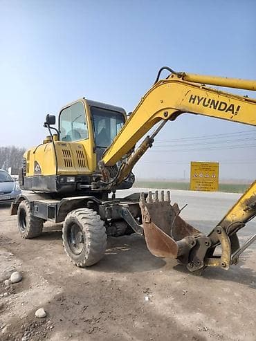 продаю экскватор: Экскаватор, Hyundai, Колесный — 3
