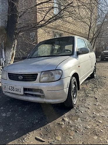 Daihatsu Cuore: 2002 г., 1 л, Механика, Бензин, Хэтчбэк