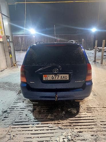 болуп: Toyota Corolla: 2002 г., 1.4 л, Кол менен иштөөчү, Бензин, Универсал — 2