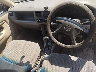 руль лассети: Mazda Demio: 2000 г., Автомат, Бензин, Универсал — 4