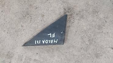 Автозапчасти: Mazda 121 накладка зеркала, Мазда 121 пластик зеркала Передний левый — 1