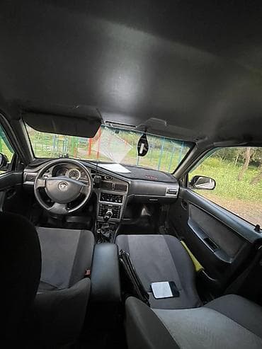 2011: Daewoo Nexia: 2011 г., 1.5 л, Механика, Бензин, Седан — 5