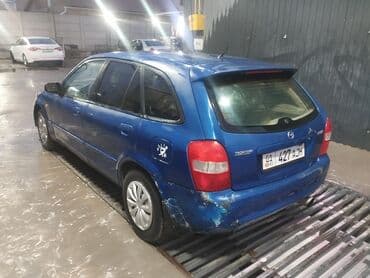 авто пулт: Mazda 323: 2001 г., Бензин, Хэтчбэк — 4