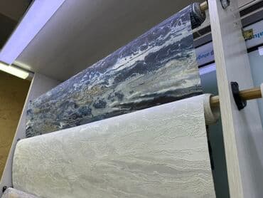 обои на мебель: Два рулона обоев с разными рисунками. Верхний рулон имеет абстрактный — 1