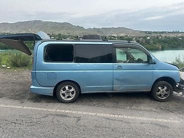 Поднимающуюся вверх), 2 передних сиденья и задний салон с раздельными