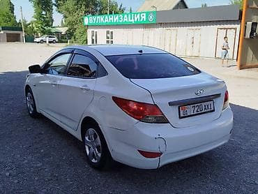 roewe ei5: Hyundai Solaris: 2013 г., 1.4 л, Механика, Бензин, Седан — 4